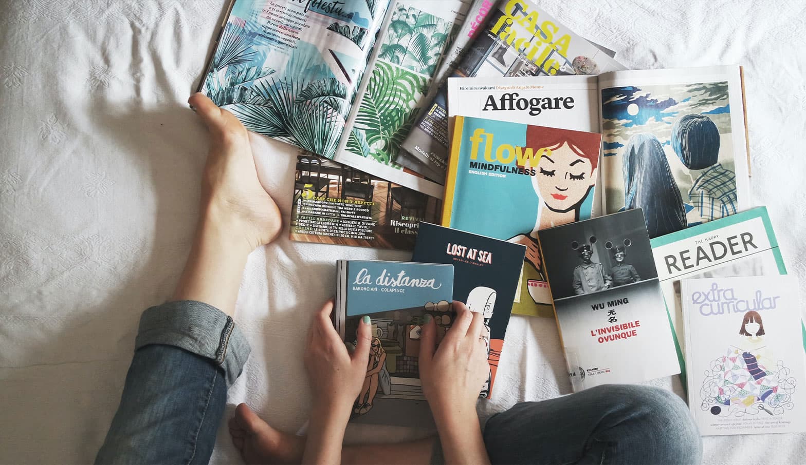 A pile of books and magazine covers