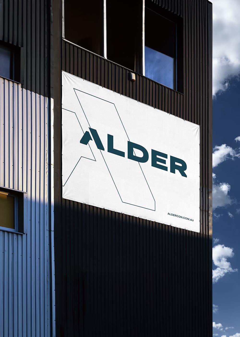 Alder Banner sign on building