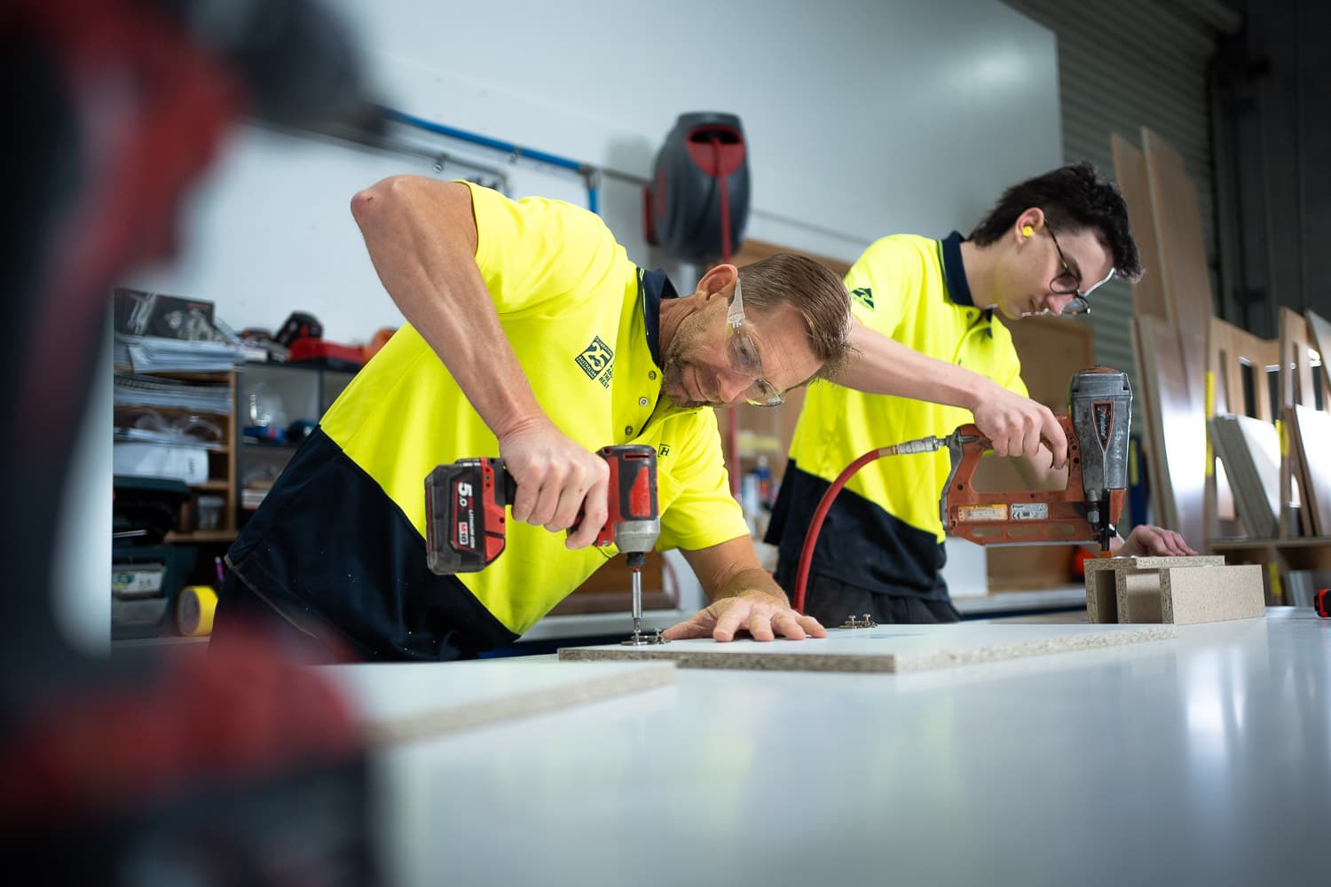 two HPP male employees drilling