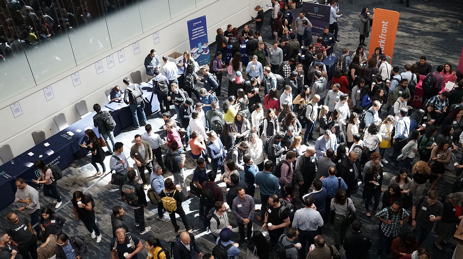Multiple people networking at a business event